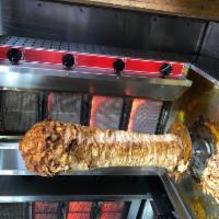 30. Chicken Gyro/Doner · Boneless chicken seasoned with Hazar special spice blend and cooked on a vertical spit.