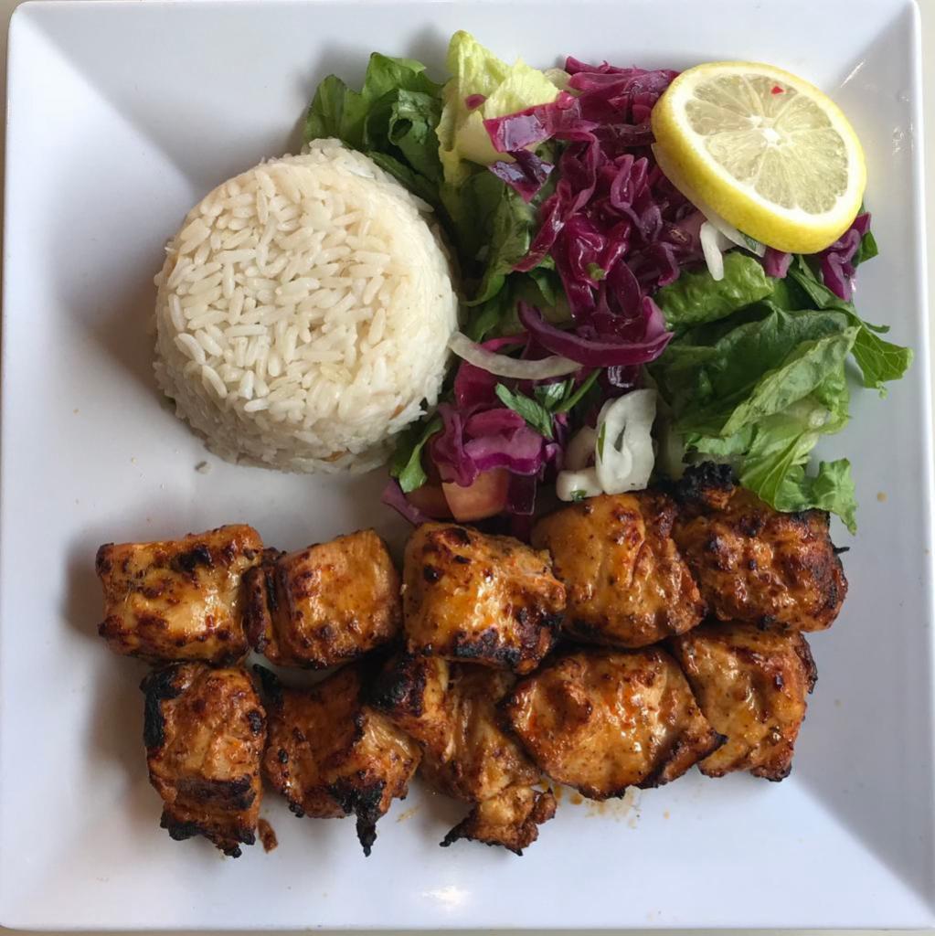 31. Chicken Shish Kebab · Boneless chicken breast marinated in Hazar special seasonings and grilled.