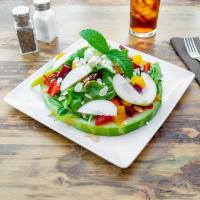 Hawaiian Salad · Watermelon slice, mixed greens, sliced almonds, green apples, strawberries beets, and feta c...