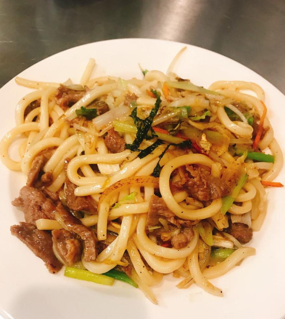 Beef Udon · Stir fried wheat noodles, (white, fatty noodles ) with all sorts of veggies and  beef.