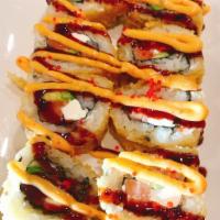 S2. Vegas Roll · Deep-fried roll, salmon, avocado, cream cheese inside, topped with  spicy mayo and eel sauce.