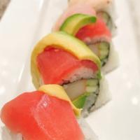 S14. Rainbow Roll · California roll topped with tuna, salmon, red snapper ,albacore and avocado.