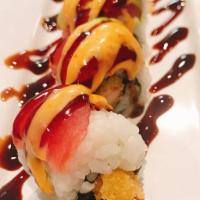 S18. Playboy Roll · Shrimp tempura, cucumber inside topped with tuna avocado and eel sauce and spicy mayo sauce.