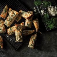 Spinach and Feta Bread · Your choice of bread topped with fresh spinach and feta, served with dipping sauce.