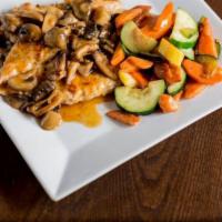 Chicken Marsala · Fresh tender chicken breast sauteed with fresh mushrooms in a classic imported Marsala wine ...