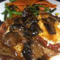Veal Bel Paese · Tender veal scallopini layered with eggplant, proscuitto and fresh mozzarella in a cream she...