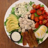 Kamuela Cobb Salad · Grape tomatoes hard boiled egg bacon avocado bleu cheese mixed field greens herb ranch dress...