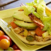 Vegan Pineapple Wrap · Vegan chick'n, grilled pineapple, tomatoes, vegan bacon, avocado, veggie mayo, lettuce on ve...