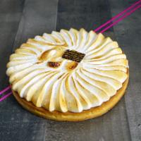 Large Lemon Meringue Tart · Crusty pie crust filled with lemon cream and covered with a soft meringue. Contains wheat, m...