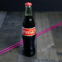 Coca-Cola® · Coca-Cola Soda.