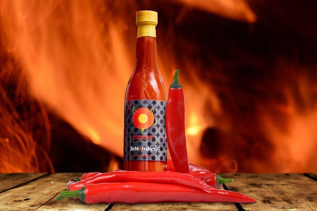 Schlotzsky’s Hot Sauce 12oz · Chock-full of Louisiana cayenne peppers, Schlotzsky's Hot Sauce complements and adds a fiery punch of flavor to both sweet and savory dishes.