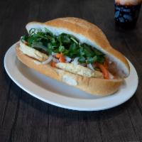 Fried Tofu · Includes mayo, pickled carrots and daikon, cucumber, onion and jalapeno peppers. Vegetarian....