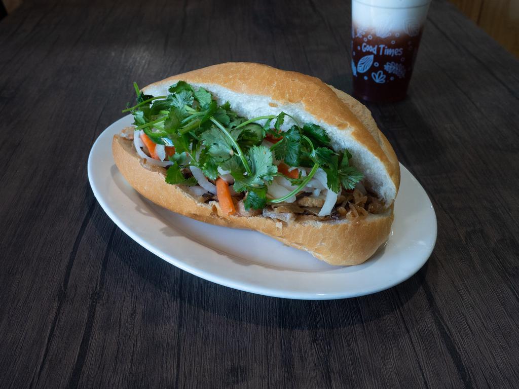 Tofu and Mushroom · Includes mayo, pickled carrots and daikon, sliced jalapeno peppers, cucumber, onions and cilantro.