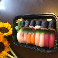 Sushi Deluxe Entree · 9 pieces sushi and California roll or tuna roll. Served with miso soup or salad.