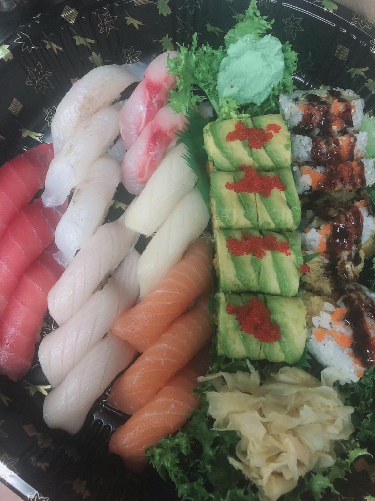 Sushi for 2 Entree · 16 pieces sushi, a Godzilla roll and a shrimp tempura roll.