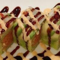 Tendo Roll · Crunchy spicy tuna wrapped with soy paper. Topped with sliced lobster and avocado. Prepared ...