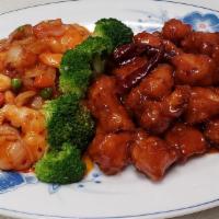 S16. Dragon & Phoenix Specialty · Hot and spicy shrimp on one side and General Tso's chicken on other side.