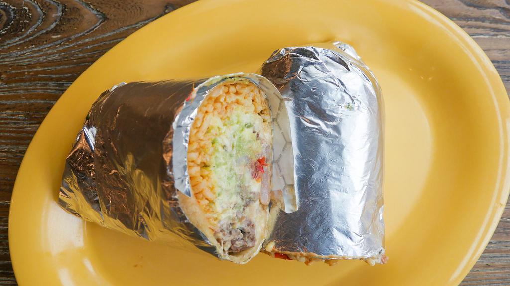 #5. Surf 'n Turf Burrito · Includes carne asada, shrimp, guacamole, rice, cheese, pico de gallo, and sour cream.