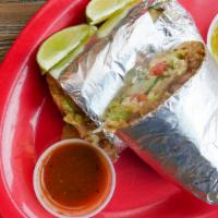 #10. Veggie Burrito · Includes rice, beans, cheese, lettuce, tomato and sour cream and guacamole.