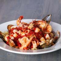 Seafood Fra Diavolo · Linguine, clams, shrimp, calamari, scallops, mussels, spicy tomato sauce or white wine garli...
