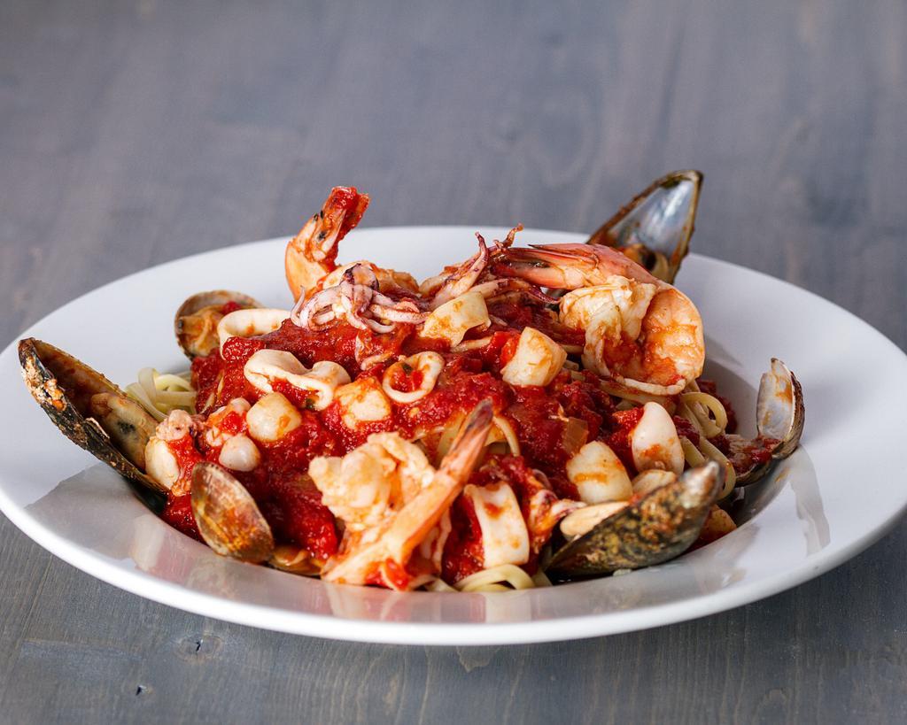 Seafood Fra Diavolo · Linguine, clams, shrimp, calamari, scallops, mussels, spicy tomato sauce or white wine garlic olive oil.
