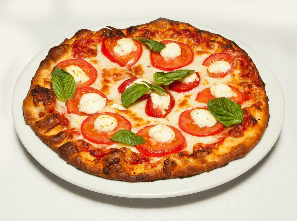 Margherita Pizza · Roma tomatoes, mozzarella, goat cheese, marinara and fresh basil.