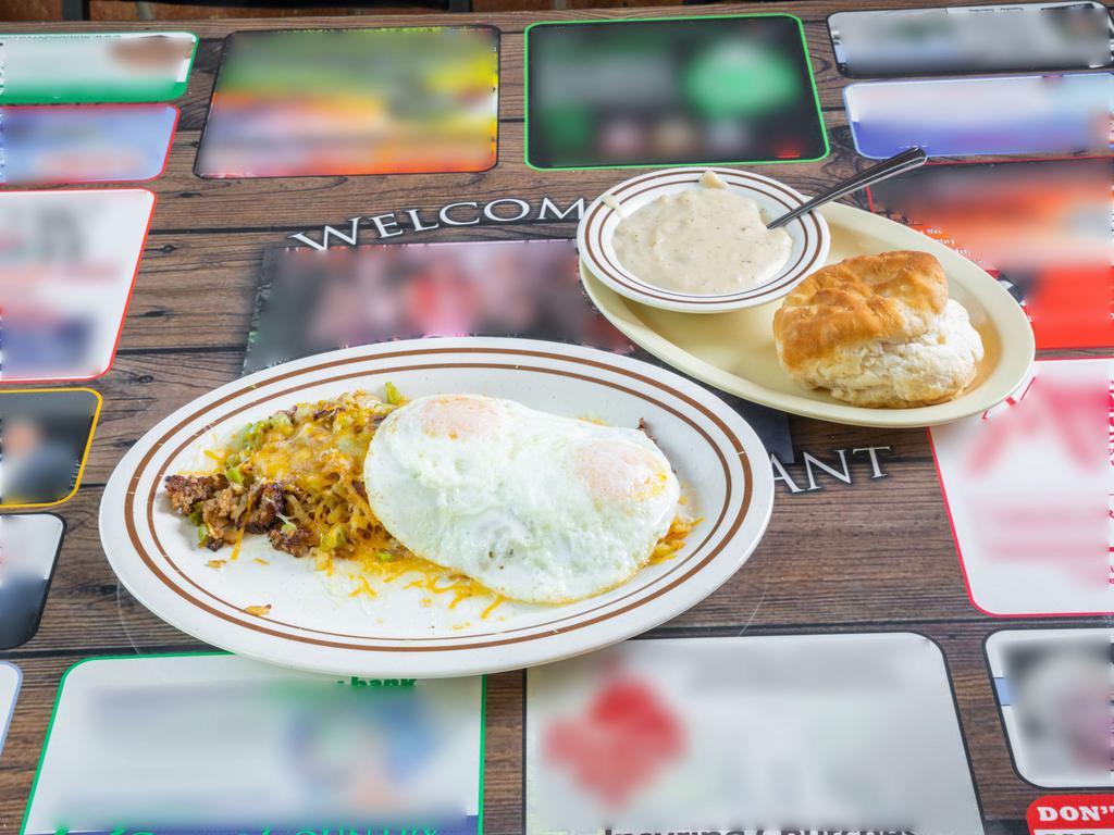 Breakfast Trash · Hash browns fried with onions, green peppers, sausage, cheese and topped with 2 eggs cooked to order. Your choice of toast or biscuit & gravy. 