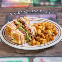 Granny’s Club Sandwich · Turkey, ham, bacon, cheese, lettuce, tomato and mayo. 