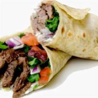 Lamb Wrap · Juicy lamb cubes marinated with special spices wrapped in warm pita bread. Stuffed with pars...