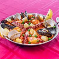 Mariscos Paella · Gluten-free. Saffron rice with shrimp, mussels, clams, scallops and calamari.