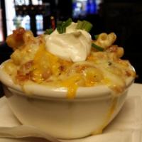 Loaded Mac · Bacon, cheddar, bleu cheese, Monterey Jack, scallions and sour cream.