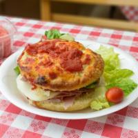 Focaccia Sandwich · Salami, mortadella, capicolla, prosciutto, cotto, provolone cheese, lettuce and tomato.