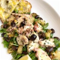 Octopus Salad alla Ligure · Crispy octopus, potatoes diced, Taggiasche Italian olives, over arugula salad with lemon dre...