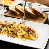 Italian mushrooms fettuccine · Fresh homemade fettuccine pasta, oven roasted Italian Porcini mushrooms creamy sauce, Parmig...