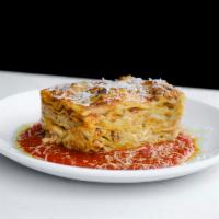 Classic Lasagna · Fresh lasagna sheets pasta, Bolognese sauce, besciamel, Parmigiano.