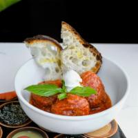 Italian Meatballs · Classic Italian meatballs, tomato sauce, fresh ricotta, bread.