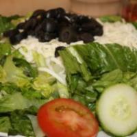 Dinner Salad · Fresh lettuce, tomatoes, cucumbers, black olives, mozzarella cheese and your choice of dress...