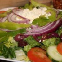 Garden Salad · Fresh lettuce, tomatoes, cucumbers, green peppers, Kalamata olives, onions and feta cheese w...