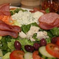 Italian Salad · Fresh lettuce, tomatoes, cucumbers, salami, chicken, Kalamata olives, Gorgonzola cheese and ...