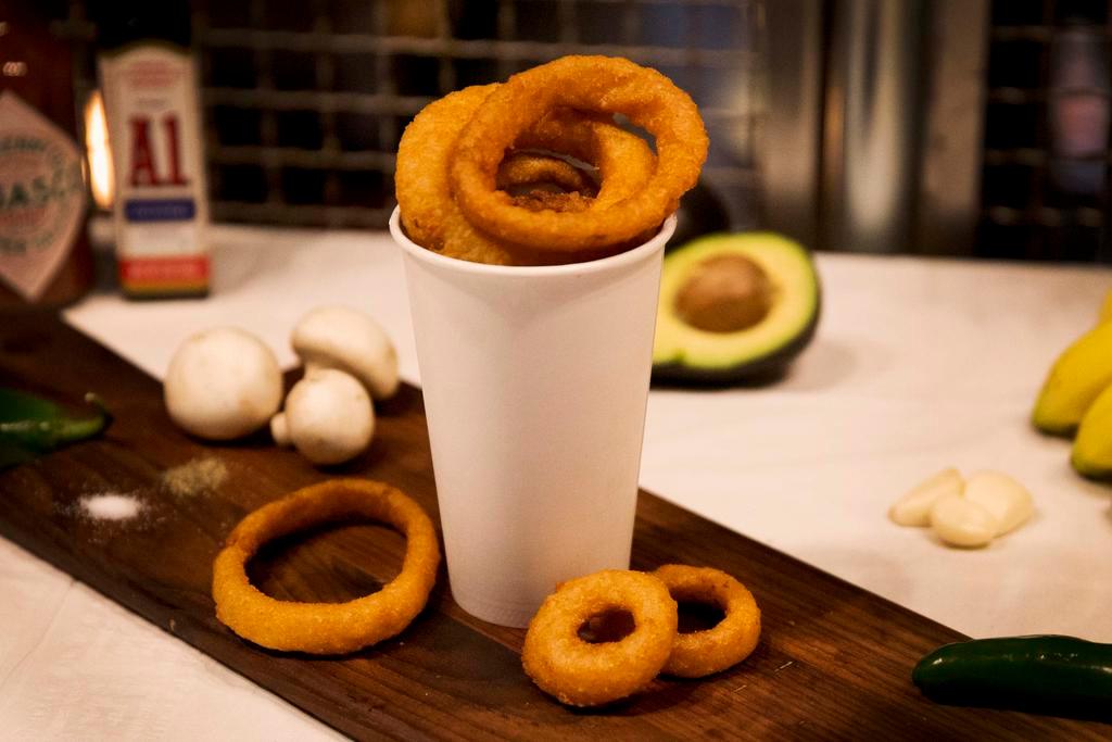 Onion Rings · Fried battered onion rings.