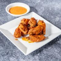 Buffalo Wings · Served with a side of Blue Cheese.
