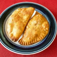 Empanadas 2pcs · Fried pastry shell filled with beef or chicken.