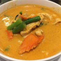 59. Panang Curry · Panang curry paste, peas, carrots, bell peppers and coconut milk. Hot and spicy.(does not co...