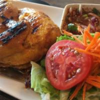 78. 1/2 BBQ Chicken · Grilled marinated chicken served with salad, steamed rice, and sweet and sour sauce.