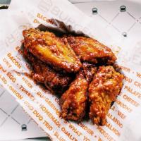 Chicken Wings · With choice of Buffalo, BBQ, or sweet crunchy chili garlic sauce.