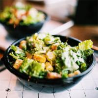 Caesar Salad · Romaine lettuce, croutons and Parmesan cheese tossed with Caesar dressing.