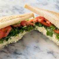 #14 - Egg Salad · Classic egg salad sandwich on toasted sourdough with tomato & watercress.  Our eggs are alwa...