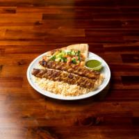 CHICKEN SHAHMI KABAB (KOOBIDEH)  · Grilled chicken breast marinated in fresh Afghan spices and seasoning.
