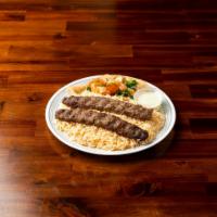 SHAHMI  KABAB  · Mixed lamb and beef, herbs and red pepper on grill 