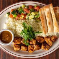 CHICKEN TIKKA KABAB  · Grilled chicken breast marinated 
in fresh Afghan spices and seasoning